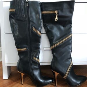 Right below the knee black boots